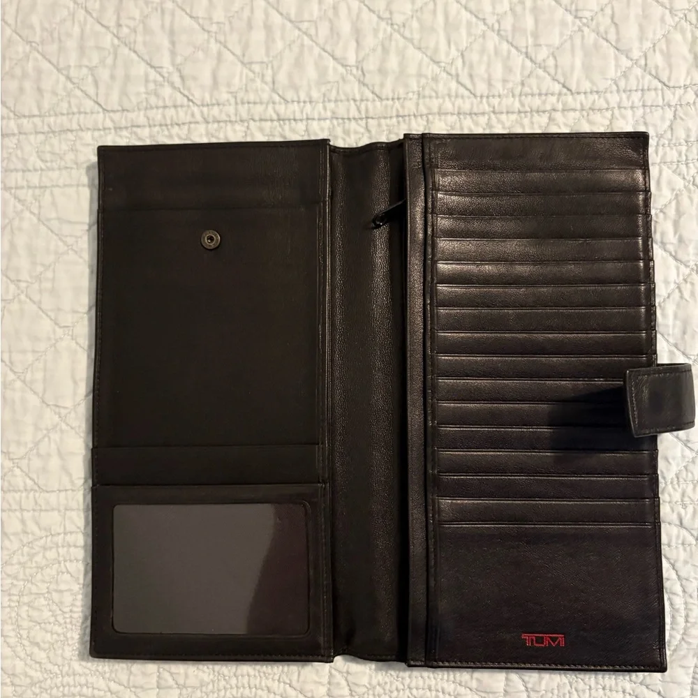 Tumi travel wallet passport card organizer.